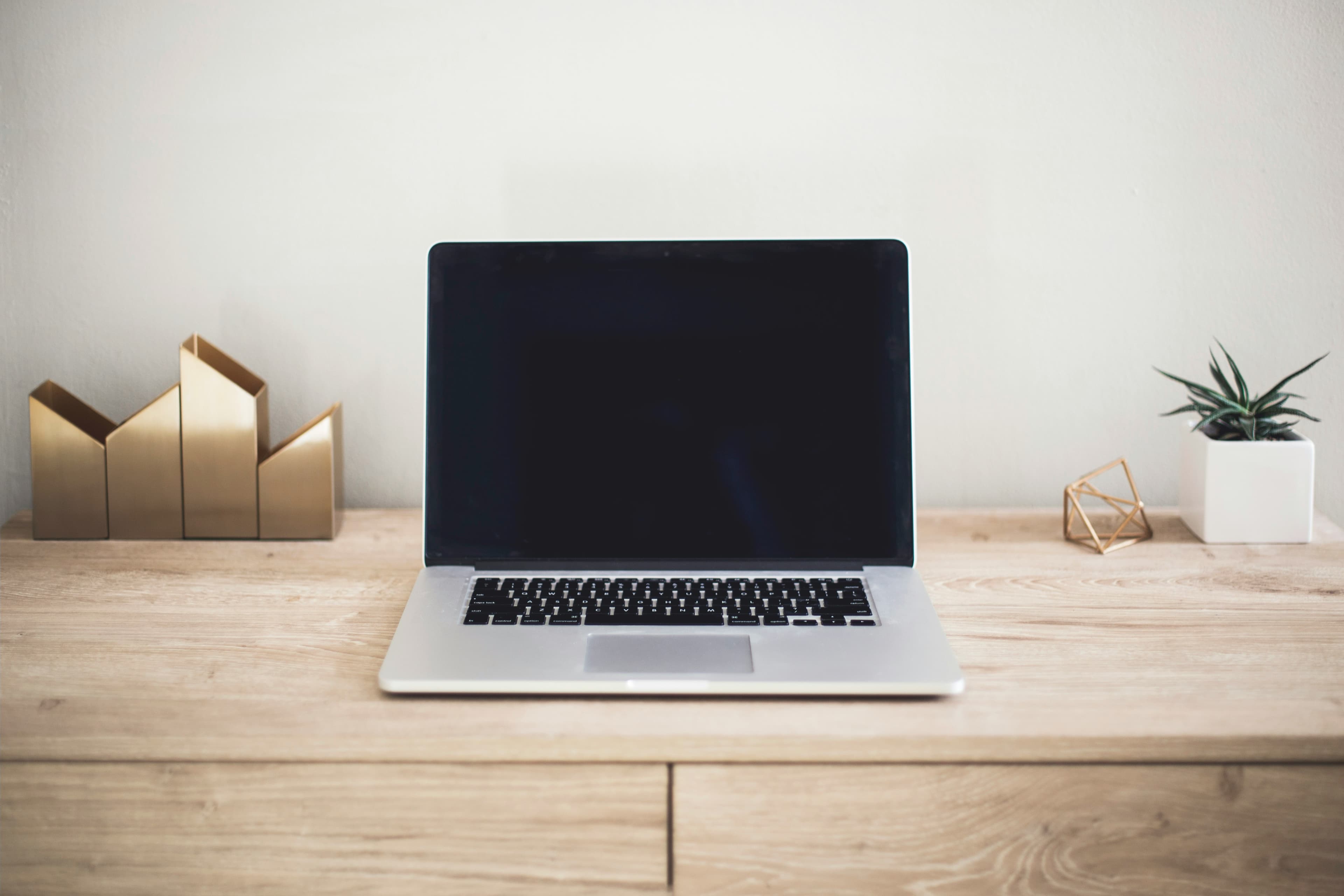 Laptop ready on a desk for a new starter